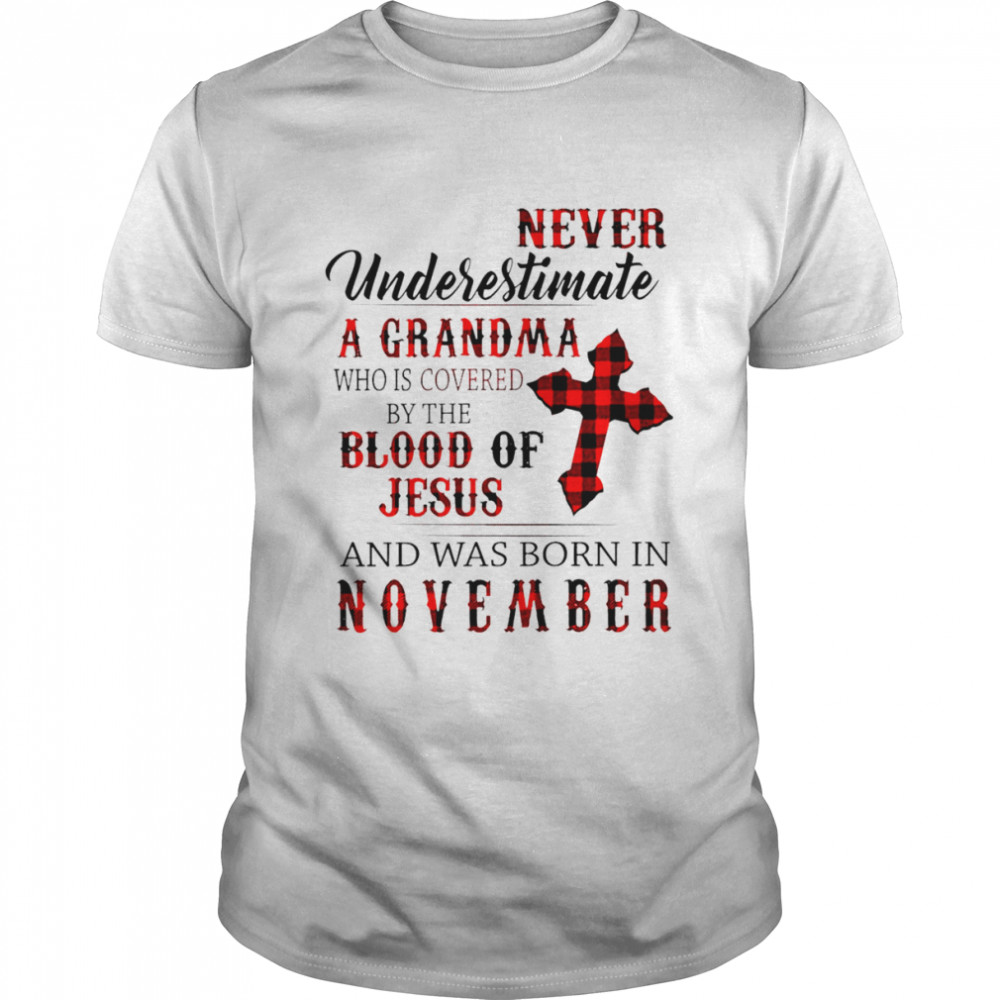 Never underestimate a grandma who is covered by the blood of jesus and was born in november shirt
